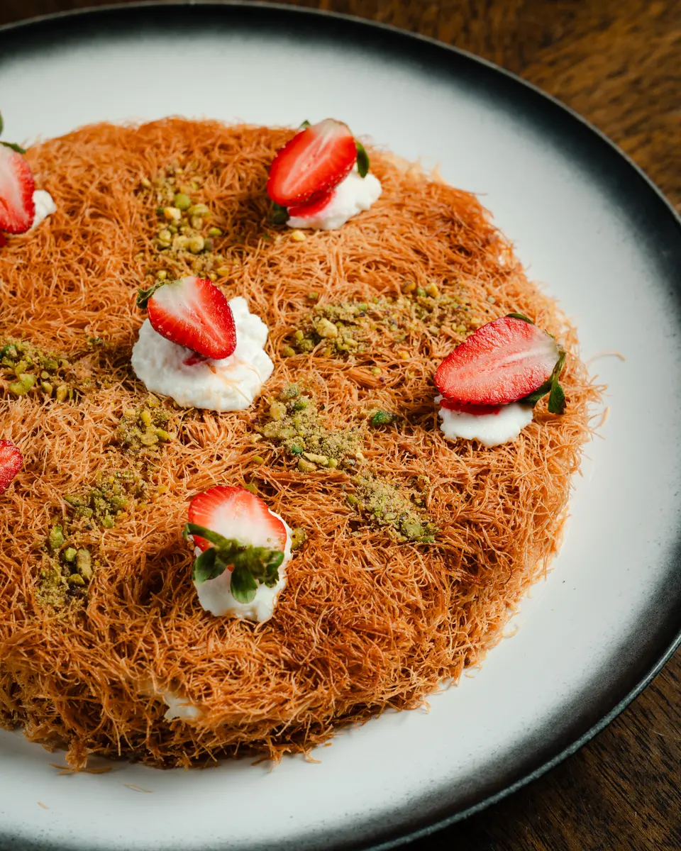 A pistachio and strawberry dessert for the table